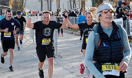 JOHN WOODS / FREE PRESS
People cross the finish line at the WFPS Run at the Canadian Mennonite University Sunday, October 20, 2024. 

Reporter: s/u