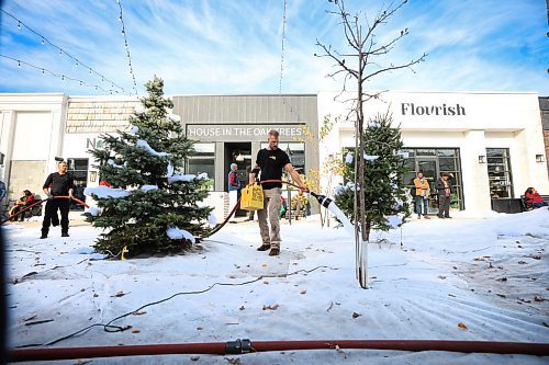 Ruth Bonneville / Free Press

Standup -Hallmark Christmas movie

Hallmark film crews create a Christmas scene by spraying white foam on the grounds  to resemble snow in the Village at Pine Ridge Hollow Monday.  

The scene was a flurry of activity with actors, film crews and a large group of extras all dressed in coats and scarfs acting as shoppers in the Christmas market.  

The television movie starting fill-in in early October and is currently entitled &quot;Following Yonder Star&quot;.

 
Oct 21st , 2023
