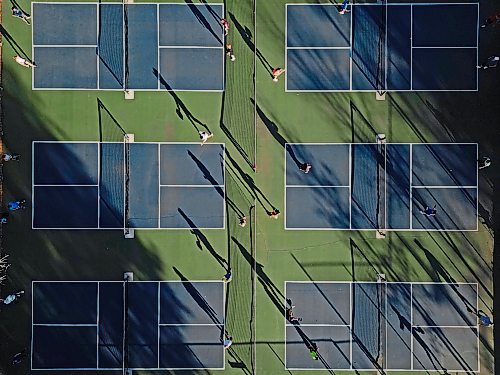 Dozens of pickleball players with the Brandon Pickleball Club take advantage of the beautiful weather to play matches at the Stanley Park Pickleball Courts on a hot Monday afternoon. 
(Tim Smith/The Brandon Sun)