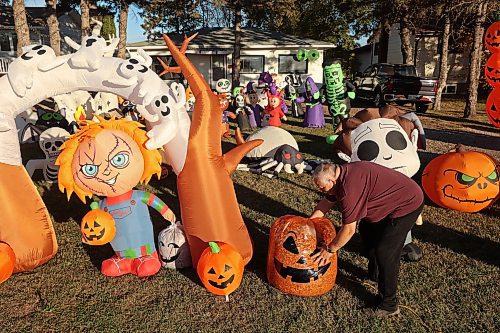 Tom Muir organizes his extensive Halloween display in the front yard of his home on Lyndale Drive on a beautiful Monday afternoon. Muir has been decorating his home for 23 years and as soon as the Halloween decorations come down, he puts up an equally impressive Christmas display.
(Tim Smith/The Brandon Sun)