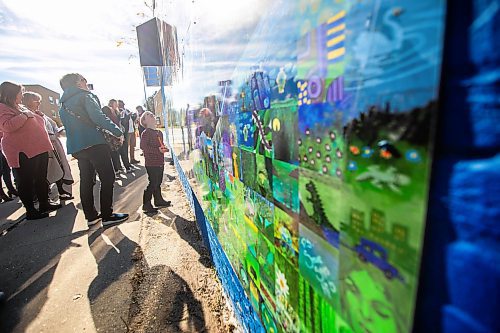 MIKAELA MACKENZIE / FREE PRESS
	
Theo Allen, five, checks out the Canada Connects Love &amp; Family mosaic mural at the unveiling at 1797 Portage Avenue on Monday, Oct. 21, 2024.

For biz story.
Winnipeg Free Press 2024