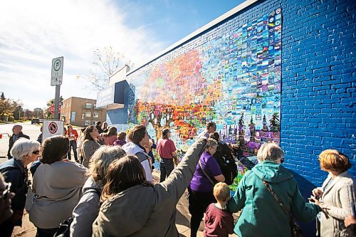 MIKAELA MACKENZIE / FREE PRESS
	
The Canada Connects Love &amp; Family mosaic mural is unveiled at 1797 Portage Avenue on Monday, Oct. 21, 2024.

For biz story.
Winnipeg Free Press 2024