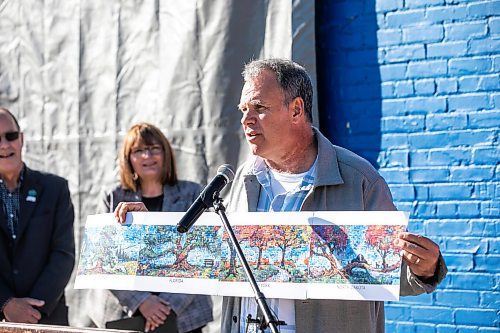 MIKAELA MACKENZIE / FREE PRESS
	
Lewis Lavoie, main designer/creator of the mural, speaks at the Canada Connects Love &amp; Family mosaic mural unveiling at 1797 Portage Avenue on Monday, Oct. 21, 2024.

For biz story.
Winnipeg Free Press 2024