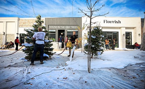 Ruth Bonneville / Free Press

Standup -Hallmark Christmas movie

Hallmark film crews create a Christmas scene by spraying white foam on the grounds  to resemble snow in the Village at Pine Ridge Hollow Monday.  

The scene was a flurry of activity with actors, film crews and a large group of extras all dressed in coats and scarfs acting as shoppers in the Christmas market.  

The television movie starting fill-in in early October and is currently entitled &quot;Following Yonder Star&quot;.

 
Oct 21st , 2023
