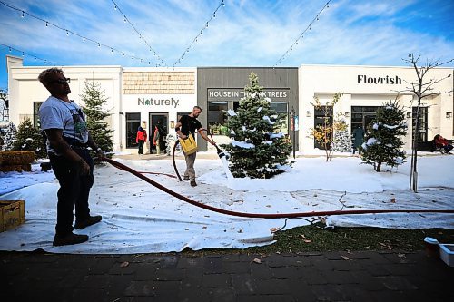 Ruth Bonneville / Free Press

Standup -Hallmark Christmas movie

Hallmark film crews create a Christmas scene by spraying white foam on the grounds  to resemble snow in the Village at Pine Ridge Hollow Monday.  

The scene was a flurry of activity with actors, film crews and a large group of extras all dressed in coats and scarfs acting as shoppers in the Christmas market.  

The television movie starting fill-in in early October and is currently entitled &quot;Following Yonder Star&quot;.

 
Oct 21st , 2023
