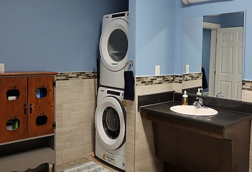 One of the bathrooms equipped with a washer and dryer at OTTER Centre in Carberry. Otter stands for overcoming trauma through everlasting relationships and is a 16-bed facility set up to reunite and support mothers and families who have been caught up or entangled in the child and family service system. (Michele McDougall/The Brandon Sun)
