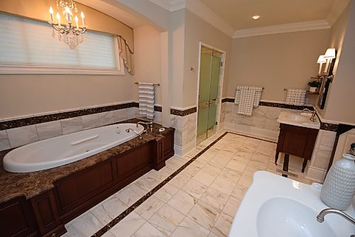 Todd Lewys / Free Press
An air of elegance pervades the richly finished ensuite.
