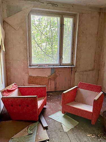 MELISSA MARTIN / FREE PRESS

Two chairs still sit in a room of an apartment in Prypiat, abandoned after the 1986 nuclear reactor disaster. 

Chornobyl feature - Melissa Martin