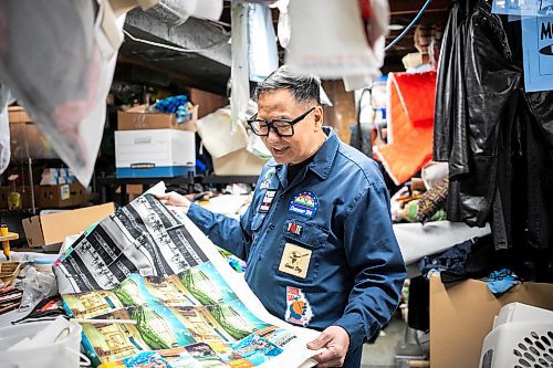 MIKAELA MACKENZIE / FREE PRESS
	
Roy Liang, the maker behind Winnipeg North of Fargo, with printed fabric for coin purses in his basement workshop space on Tuesday, Oct. 22, 2024.

For Eva Wasney story.
Winnipeg Free Press 2024