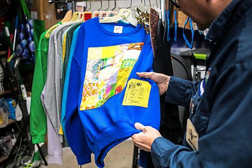 MIKAELA MACKENZIE / FREE PRESS
	
Roy Liang, the maker behind Winnipeg North of Fargo, shows quilted sweaters in his garage workshop space on Tuesday, Oct. 22, 2024.

For Eva Wasney story.
Winnipeg Free Press 2024