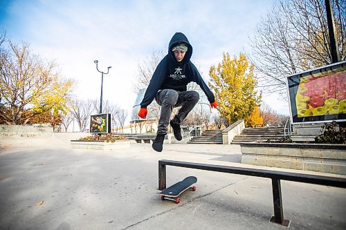 MIKAELA MACKENZIE / FREE PRESS
	
Tanner Trees hops a rail at the skate park at The Forks on Thursday, Oct. 24, 2024.

Standup.
Winnipeg Free Press 2024