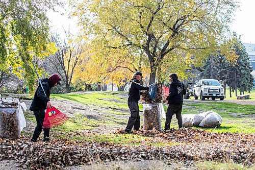 MIKAELA MACKENZIE / FREE PRESS
	
Sam Stephanson (left), Sigmundur Benediktson, and Jacob Bauer with Bell&#x573; Property Services rake leaves at The Forks on Thursday, Oct. 24, 2024. At The Forks they average 50-60 bags of leaves per day, and will continue raking until the snow comes (they started about a week ago).

For &#x460;story.
Winnipeg Free Press 2024