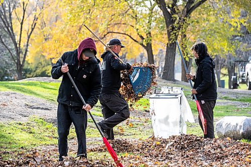 MIKAELA MACKENZIE / FREE PRESS
	
Sam Stephanson (left), Sigmundur Benediktson, and Jacob Bauer with Bell&#x573; Property Services rake leaves at The Forks on Thursday, Oct. 24, 2024. At The Forks they average 50-60 bags of leaves per day, and will continue raking until the snow comes (they started about a week ago).

For &#x460;story.
Winnipeg Free Press 2024