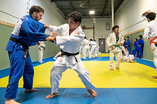 BROOK JONES/FREE PRESS
First degree black belt (shodan) judoka Shogun Laszko, 23, (white judo gi) who is a member of Team Manitoba practices with Michael Akbashev (blue judo gi), 21, who is a member of Canada's national judo team, during a training session at Nakamura Judo in Winnipeg, Man., Thursday, Oct. 24, 2024.