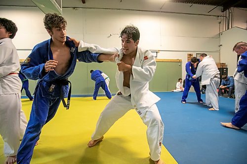 BROOK JONES/FREE PRESS
First degree black belt (shodan) judoka Shogun Laszko (white judo gi), 23, who is a member of Team Manitoba practices with first degree black belt judoka Loic Beaton (blue judo gi), who is from Montreal, during a training session at Nakamura Judo in Winnipeg, Man., Thursday, Oct. 24, 2024.