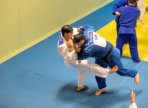 BROOK JONES/FREE PRESS
First degree black belt (shodan) judoka Shogun Laszko (white judo gi), 23, who is a member of Team Manitoba practices footsweeps with Michael Akbashev (blue judo gi), 21, who is a member of Canada's national judo team, during a training session at Nakamura Judo in Winnipeg, Man., Thursday, Oct. 24, 2024.