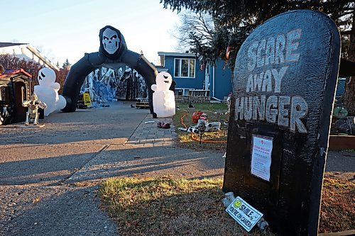 Decorations cover the front lawn at Cedar Hollow haunted house on Cedar Bay in Brandon on Friday evening. The haunted house runs tonight and Halloween from 5-9 p.m. and with a milder scare-free haunted house Sunday from 2-6 p.m. Non-perishable goods and other items are being collected for Samaritan House Ministries. (Photos by Tim Smith/The Brandon Sun)