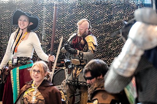 MIKAELA MACKENZIE / FREE PRESS
	
LARPer Brian Stewart gets suited up at Comiccon at the RBC Convention Centre on Friday, Oct. 25, 2024.

Standup.
Winnipeg Free Press 2024