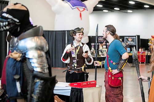 MIKAELA MACKENZIE / FREE PRESS
	
LARPers Kensley MacNair (left) and Desmond Solstrum at Comiccon at the RBC Convention Centre on Friday, Oct. 25, 2024.

Standup.
Winnipeg Free Press 2024