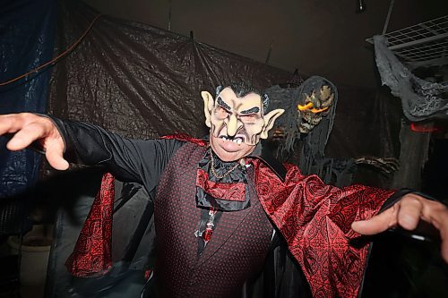 25102024
Vampire Dan Robleski spooks visitors to the Cedar Hollow haunted house on Cedar Bay in Brandon on Friday evening. (Tim Smith/The Brandon Sun)