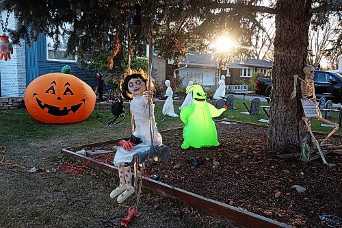 25102024
Decorations cover the front lawn at Cedar Hollow haunted house on Cedar Bay in Brandon on Friday evening. The haunted house runs Friday, Saturday and Halloween from 5-9PM and with a milder scare-free haunted house Sunday from 2-6PM. Non-perishable goods and other items are being collected for Samaritan House Ministries. 
(Tim Smith/The Brandon Sun)