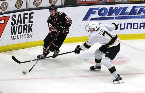 Brandon Wheat Kings defenceman Charlie Elick (7) tries to slow Calgary Hitmen forward Ethan Moore (18) during Western Hockey League action on Saturday at Westoba Place. (Perry Bergson/The Brandon Sun)
Oct. 28, 2024