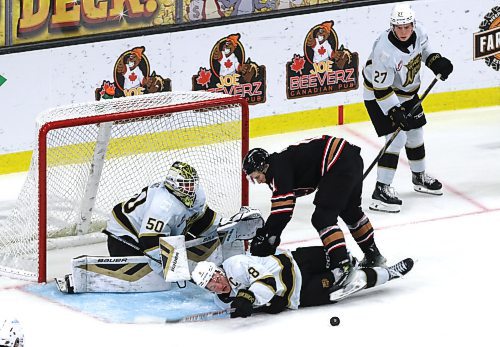 Brandon Wheat Kings captain Quinn Mantei (8) is hauled down by Calgary Hitmen forward Ben Kindel (11) in front of goalie Ethan Eskit (50) as defenceman Luke Shipley (27) looks on during Western Hockey League action on Saturday at Westoba Place. Kindel had a pair of goals but Eskit made 36 saves as the Wheat Kings escaped with a 4-3 overtime victory. (Perry Bergson/The Brandon Sun)
Oct. 28, 2024