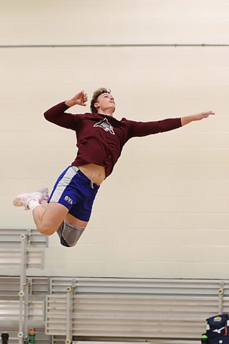 Noah Barcellona skies for a back-row attack during Assiniboine College Cougars men's volleyball practice on Monday. (Thomas Friesen/The Brandon Sun)