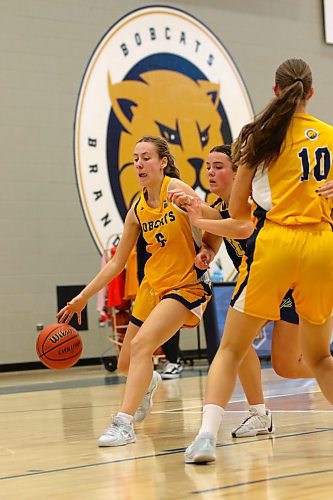 Madison Schettler drives against the Briercrest Clippers in pre-season women's basketball action on Oct. 18. (Thomas Friesen/The Brandon Sun)