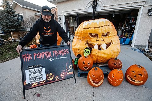 JOHN WOODS / FREE PRESS
Chris Okell, who for years has been decorating donated pumpkins outside his St. Vital home to raise funds for CancerCare Manitoba, sets up his display on his driveway Monday October 28, 2024. Okell was motivated to make and start his Pumpkin Promise charity when his mother Marietta died of pancreatic cancer in 2010.

Reporter: massimo