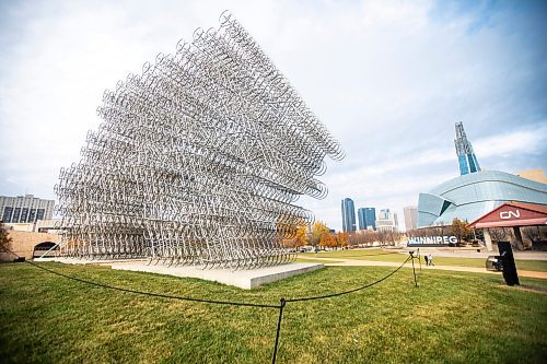 MIKAELA MACKENZIE / FREE PRESS
	
The Forever Bicycles statue returns to The Forks on a ten year loan from the National Gallery of Canada in Winnipeg on Tuesday, Oct. 29, 2024.

Standup.
Winnipeg Free Press 2024