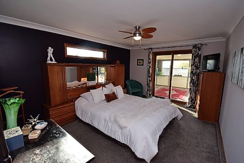 Todd Lewys / Free Press
The primary bedroom is a tranquil refuge with an unexpected feature &#x2014; a gorgeous three-season sunroom.