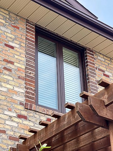 Marc LaBossiere / Free Press
The new maintenance-free Voyageur window unit is pre-painted at the factory to match the chocolate-brown trim of the house.