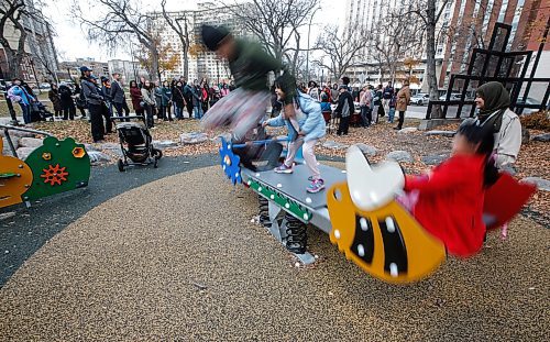 JOHN WOODS / FREE PRESS
Children play on a play structure as politicians and stakeholders hold an opening ceremony of the renovated play structure in Central Park Tuesday October 29, 2024.

Reporter: s/u