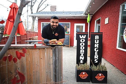 Ruth Bonneville / Free Press

Intersection - woodbine burgers

Outside photo of their patio. 

Vellan Vadivelu, owner and head chef of Woodbine Burgers, a new locally made, burger pickup window which specializes in smash burgers.  

Story:  an Intersection piece on Woodbine Burgers that opened in the Spring of this year. Woodbine specializes in smash burgers -  placing what looks like a meatball on the grill, then pressing it with a metal burger stamp to create a thin, crispy patty and adding spices and onions during the frying process. 

Their signature burger is the SmashZilla - Double Waygu Smash Patties Grilled with Red Onions and their signature burger seasoning, Sharp Cheddar Cheese, goat cheese crema, Secret Blueberry Mayo, Raw Red onions, butter pickles, 3 Crispy Onion onions, crispy bacon, Chipotle Mayo, on a butter-toasted brioche bun.

They also offer poutines, chicken dishe s and deep-fried Oreos, the latter if you have room for dessert. 

This is for the Sat. Nov. 2 Intersection 

Woodbine Burgers (@woodbineburgers)  Instagram photos and videos

Dave Sanderson story

Oct 29th, , 2024
