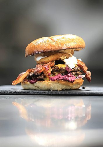 Ruth Bonneville / Free Press

Intersection - woodbine burgers

Photo of Woodbine Burgers signature burger, the SmashZilla!  

Ingredients - Double Waygu Smash Patties Grilled with Red Onions and their signature burger seasoning, Sharp Cheddar Cheese, goat cheese crema, Secret Blueberry Mayo, Raw Red onions, butter pickles, 3 Crispy Onion onions, crispy bacon, Chipotle Mayo, on a butter-toasted brioche bun.

Vellan Vadivelu, owner and head chef of Woodbine Burgers, a new locally made, burger pickup window which specializes in smash burgers.  

Story:  an Intersection piece on Woodbine Burgers that opened in the Spring of this year. Woodbine specializes in smash burgers -  placing what looks like a meatball on the grill, then pressing it with a metal burger stamp to create a thin, crispy patty and adding spices and onions during the frying process. 


They also offer poutines, chicken dishe s and deep-fried Oreos, the latter if you have room for dessert. 

This is for the Sat. Nov. 2 Intersection 

Woodbine Burgers (@woodbineburgers) &#x2022; Instagram photos and videos

Dave Sanderson story

Oct 29th, , 2024
