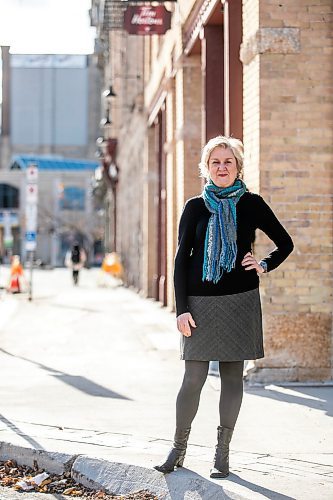 MIKAELA MACKENZIE / FREE PRESS
	
Ann Hodges, the new PTE artistic director, outside Red River College building (where she got her start with PTE selling subscriptions) in Winnipeg on Wednesday, Oct. 30, 2024.

For Ben Waldman story.
Winnipeg Free Press 2024