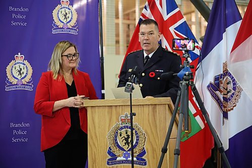 30102024
Judge Shauna Hewitt-Michta looks on as new Brandon Police Service Chief Tyler Bates recites his oath of office and oath of allegiance during his swearing in ceremony at the Brandon Armoury on Wednesday.
(Tim Smith/The Brandon Sun)