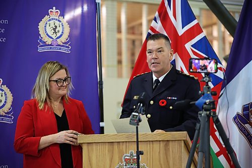 30102024
Judge Shauna Hewitt-Michta looks on as new Brandon Police Service Chief Tyler Bates recites his oath of office and oath of allegiance during his swearing in ceremony at the Brandon Armoury on Wednesday.
(Tim Smith/The Brandon Sun)