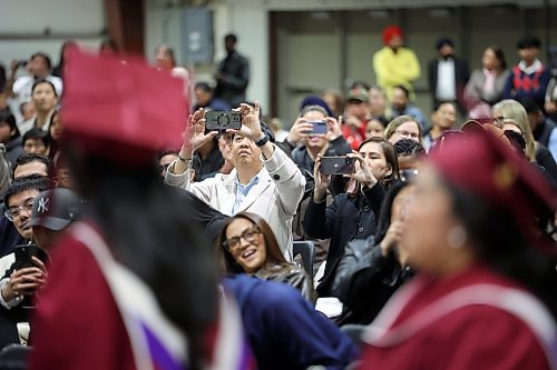 30102024
Family and other supporters watch and take photos as Assiniboine College graduates receive their certificates and diplomas during the college&#x2019;s fall graduation ceremony at the Keystone Centre on Wednesday. (Tim Smith/The Brandon Sun)