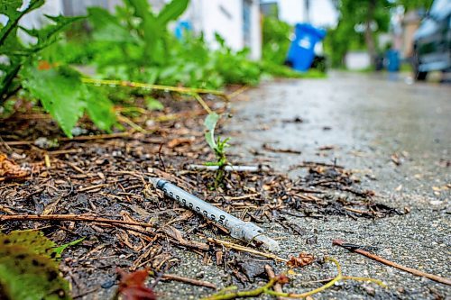 NIC ADAM / FREE PRESS
A used needle on the ground of the back lane between College and Boyd. The city said they couldn&#x2019;t do the cleanup itself. 
240704 - Thursday, July 04, 2024.

Reporter: Malak