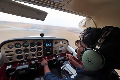 Sai Pranav Chinta brings "Wiley" in for a landing on the runway at the Brandon airport on Thursday. The flight instructor took three crucial performance tests, include his private pilot licence exam, in the Cessna 172. (Photos by Connor McDowell/The Brandon Sun)