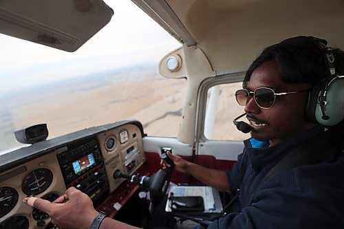 Sai Pranav Chinta navigates "Wiley," a Cessna 172 aircraft, over the city of Brandon on Thursday. The flight instructor took three crucial performance tests, include his private pilot licence exam plane given a nickname from its registration characters "YLE". (Connor McDowell/Brandon Sun)