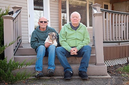 31102024
Lawrence Medd and his father Bill Medd sit with Lawrence&#x2019;s french bulldog Lola at the home they are currently staying at in Killarney. Lawrence is visiting his dad in Killarney from Alberta. Lola woke them in the night Sunday as Bill&#x2019;s duplex went up in flames. The duplex on Finlay Street was completely destroyed in the fire but the Medd&#x2019;s and the duplex&#x2019;s other resident all escaped the blaze. 
(Tim Smith/The Brandon Sun)