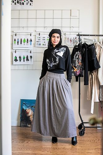 MIKAELA MACKENZIE / FREE PRESS
	
Modest clothing designer Hafsa Altaf poses in some of her hand-painted pieces in her workshop in Winnipeg on Thursday, Oct. 31, 2024.

For AV story.
Winnipeg Free Press 2024