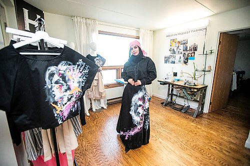 MIKAELA MACKENZIE / FREE PRESS
	
Modest clothing designer Hafsa Altaf poses in some of her hand-painted pieces in her workshop in Winnipeg on Thursday, Oct. 31, 2024.

For AV story.
Winnipeg Free Press 2024