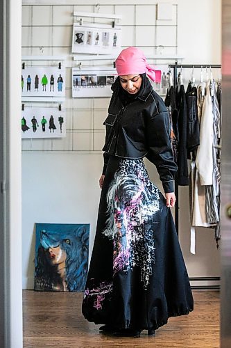 MIKAELA MACKENZIE / FREE PRESS
	
Modest clothing designer Hafsa Altaf poses in some of her hand-painted pieces in her workshop in Winnipeg on Thursday, Oct. 31, 2024.

For AV story.
Winnipeg Free Press 2024