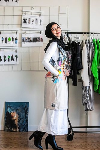 MIKAELA MACKENZIE / FREE PRESS
	
Modest clothing designer Hafsa Altaf poses in some of her hand-painted pieces in her workshop in Winnipeg on Thursday, Oct. 31, 2024.

For AV story.
Winnipeg Free Press 2024