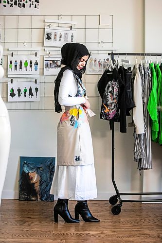 MIKAELA MACKENZIE / FREE PRESS
	
Modest clothing designer Hafsa Altaf poses in some of her hand-painted pieces in her workshop in Winnipeg on Thursday, Oct. 31, 2024.

For AV story.
Winnipeg Free Press 2024