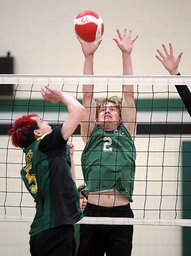 01112024
Owen Falk #2 of the Neelin Spartans leaps to block a spike by Aidan McVicor #5 of the John Taylor Pipers during their varsity match in the 30th Annual Spartan Dig volleyball tournament at &#xc9;cole Secondaire Neelin High School on Friday. Ninety-six high schools are taking part in 276 matches over two days. 
(Tim Smith/The Brandon Sun)